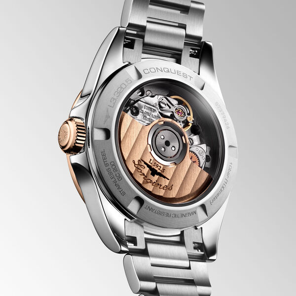 Conquest 30 mm automatique en acier inoxydable et coiffe or rose